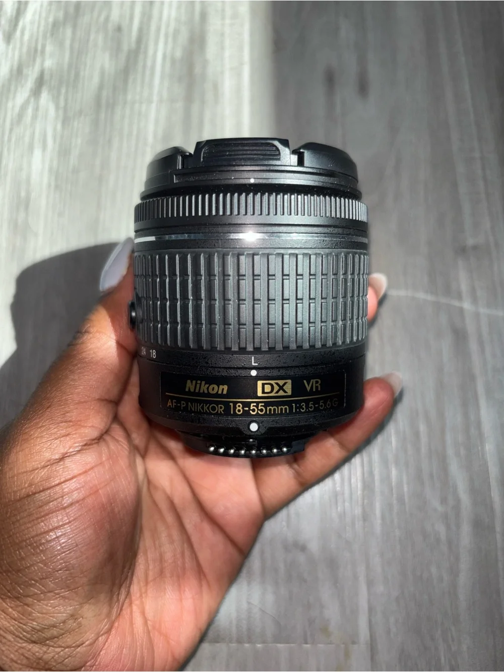Nikon D3500 Black DSLR Camera with Black Zoom Lens and Red Accent